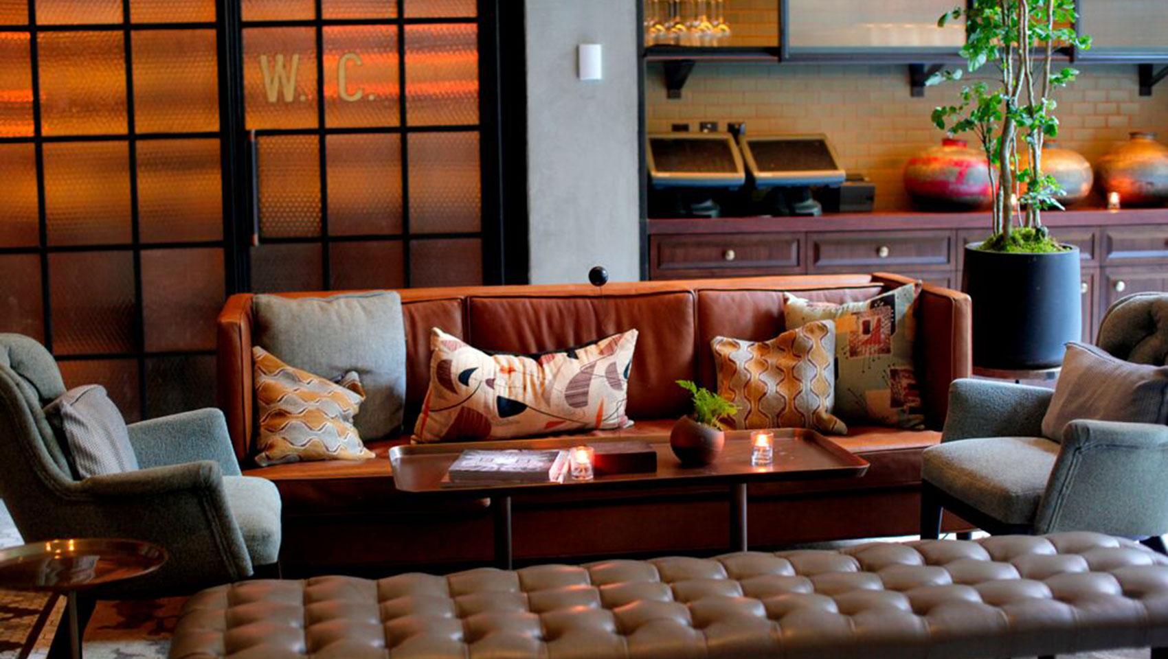 The Vine seating showing couches surrounding coffee table