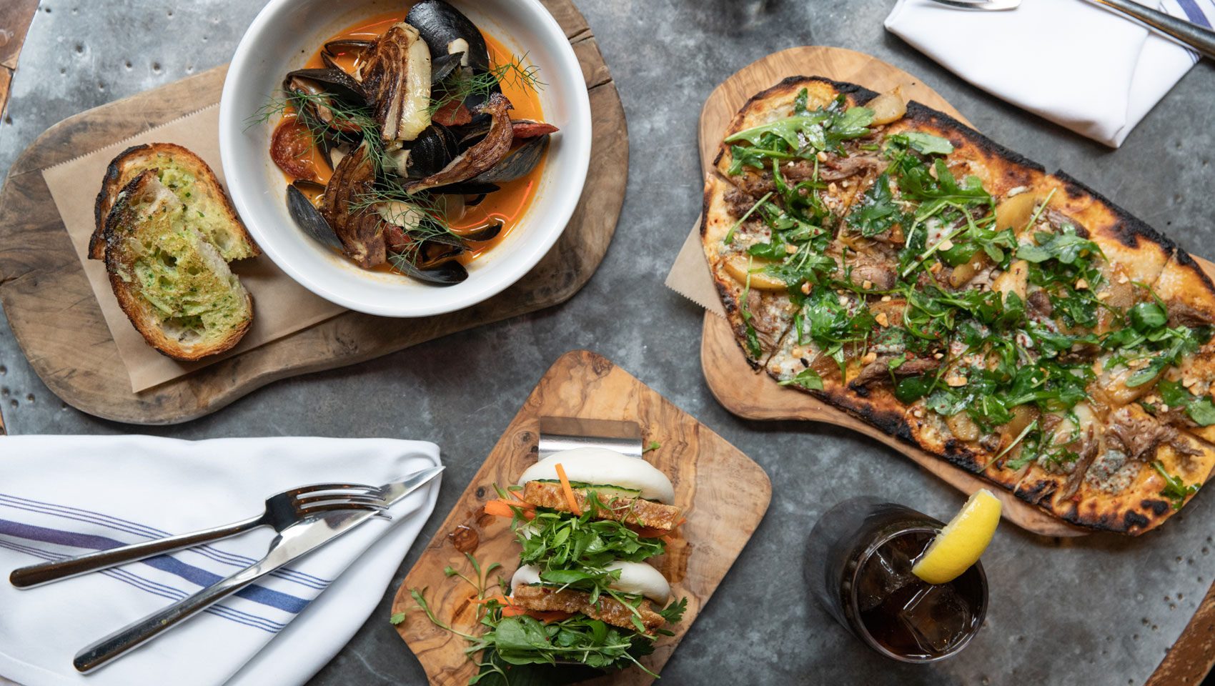 The Vine shareable bites on top of wooden slabs on top of table